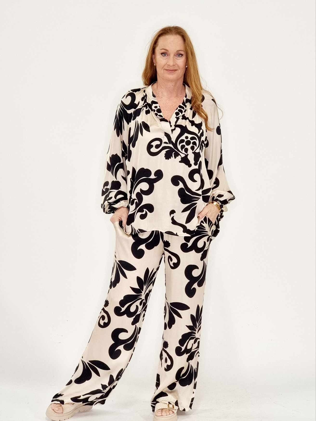 Buks med lommer vide ben og elastik i livet. Viscose. One Size